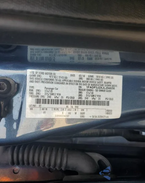 2018 Ford Focus Titanium z USA, uszkodzony, nr VIN 1FADP3J2XJL294656